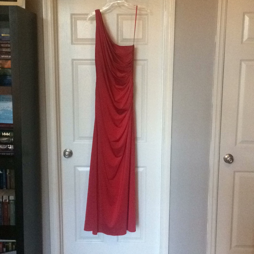 Red one shoulder evening gown